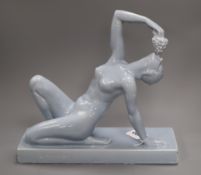 A French Art Deco blue glazed figure of a girl, signed H Fugere height 34cm