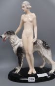 A large Goldscheider group of a nude woman with Borzoi, designed by Lorenzl restorations