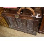 An 18th century and later oak coffer W.105cm
