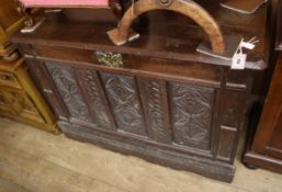 An 18th century and later oak coffer W.105cm