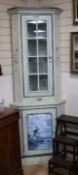 A painted Dutch style standing corner cabinet H.216cm