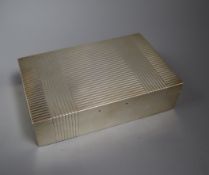 A George V ribbed silver rectangular cigarette box by Mappin & Webb, London, 1933 (handle missing?),