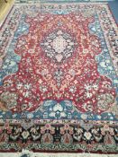 A Kashan carpet 350 x 244cm
