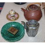 A pottery teapot, three green leaf plates, an ink stand, etc.