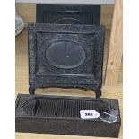 An Indian carved ebony tambour topped writing box and two similar easel frames frame height 25cm