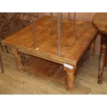 A square pine two tier coffee table W.91cm