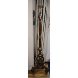 A Florentine style carved giltwood lamp standard on a tripod base H.160cm