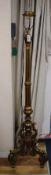 A Florentine style carved giltwood lamp standard on a tripod base H.160cm