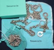 A Tiffany & Co sterling bracelet, a white metal necklace and matching bracelet and a white metal