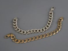 A 9ct gold curb-link bracelet, 34.5g and a similar silver bracelet.