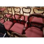 Six Victorian mahogany buckle back dining chairs (4 drop-in seats, 2 stuffover seats) and a pair