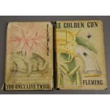 Fleming, Ian - You Only Live Twice, 1964 and The Golden Gun, 1965, both 1st editions, each in torn