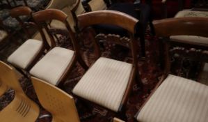 A set of four William IV rosewood dining chairs