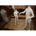 Two life-size child mannequins together with a tailor's dummy largest 142cm high