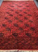 An Afghan carpet 365 x 254cm