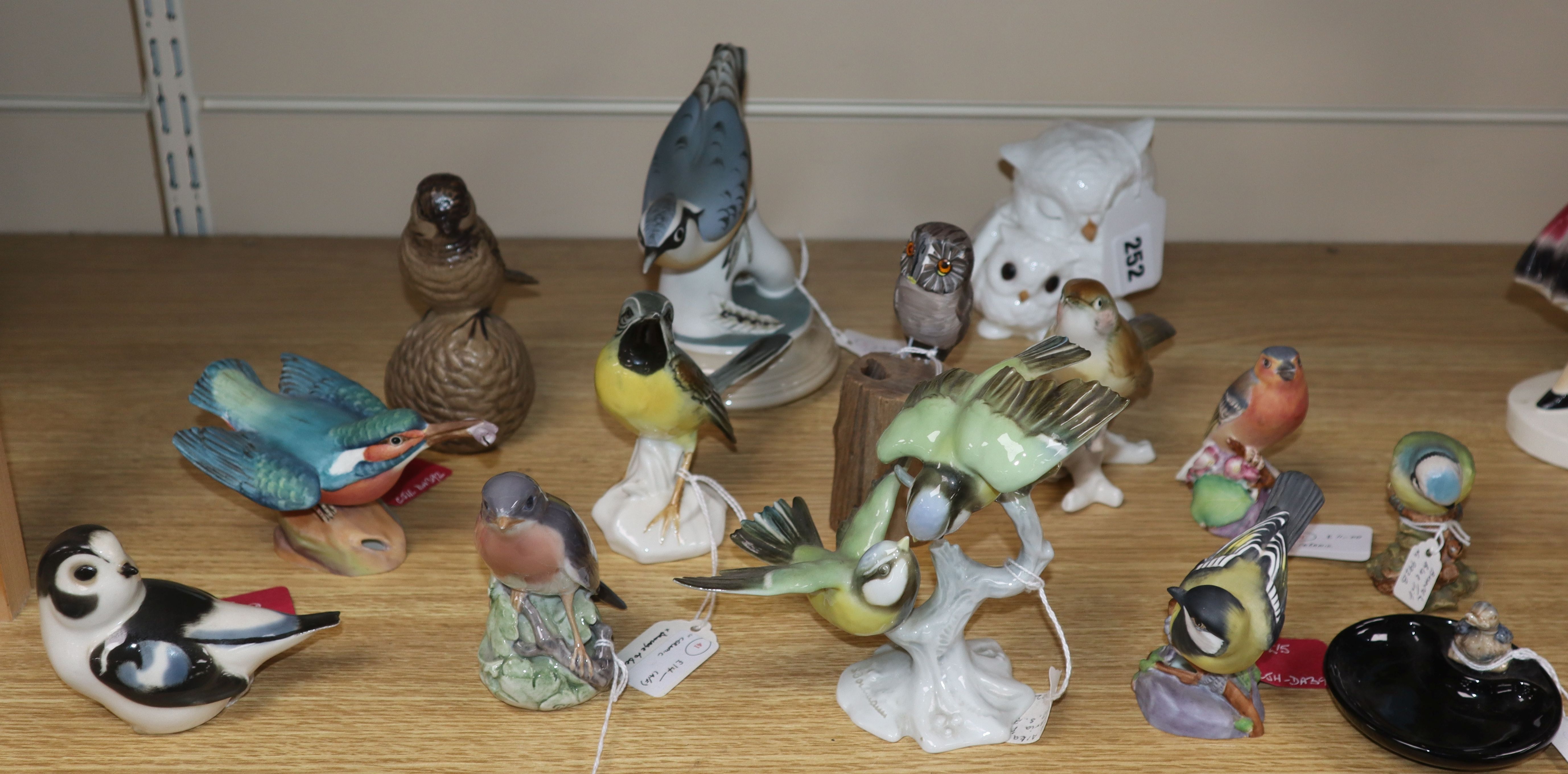 A collection of fourteen mixed bird ornaments including Beswick