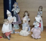 A Lladro figure of Natures Bounty, Sweet Stroll, Spring, A Big Hug, Girl and chicken, Girl and