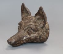 A 19th century cast iron fox-head depth 15cm