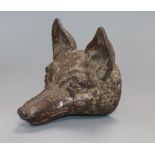 A 19th century cast iron fox-head depth 15cm