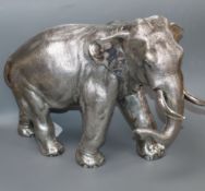 A large filled silver model of an Indian elephant (trunk down), Sheffield 1996, Camelot