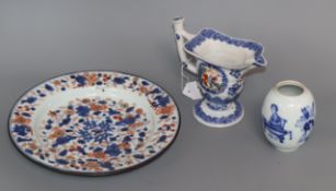 A Chinese blue and white jug with figural painted scene, a blue and white vase and a dish
