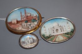 Three Indian miniatures, mounted in white or yellow metal mounts, one with rose cut diamond