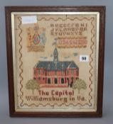 A late 19th/early 20th century American sampler, 'Capitol Williamsburg, VA' overall 39 x 33cm