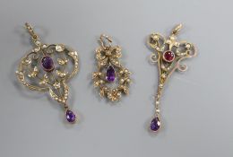 Three assorted Edwardian yellow metal and gem set drop pendants, including amethyst, two stamped