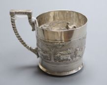 An Indian embossed white metal mug, stamped 'C. Krishniah Chetty, height 82mm.