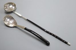 A 19th century white metal toddy ladle with inset coin bowl and a continental white metal server.
