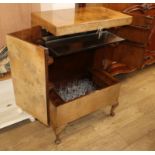 A 1930's walnut veneered cocktail cabinet, fitted with a part suite of vine etched drinking