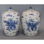 Two lidded blue and white vases height 32cm