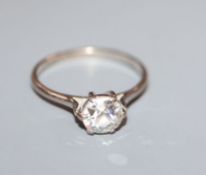 A diamond solitaire ring in white gold setting (tests as 18ct), size L.