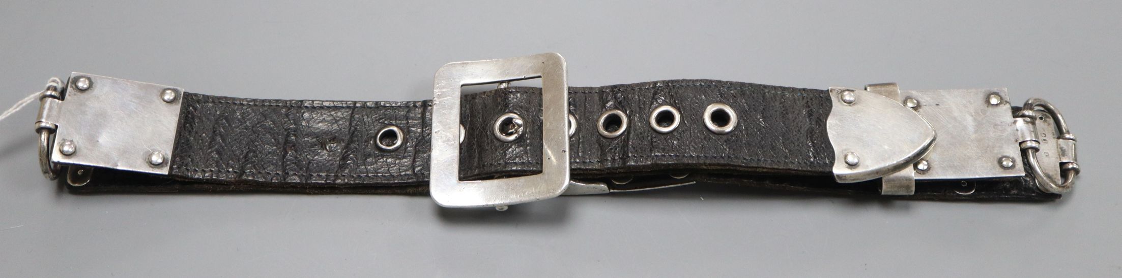 A Victorian silver mounted leather strap/belt, retailed by Shafer, Piccadilly, London, 1872,