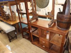 A hardwood office storage cabinet, fitted two drawers and open shelves, a narrow four tier unit