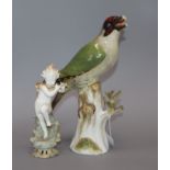 A Meissen porcelain woodpecker and a porcelain angel tallest 27m (both a.f.)