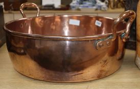 A Victorian copper preserve pan handle to handle 55cm