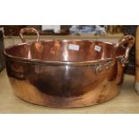 A Victorian copper preserve pan handle to handle 55cm