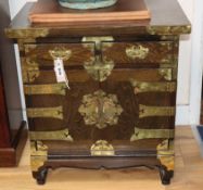 A pair of Korean style brass mounted hardwood bedside chests W.56cm