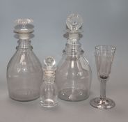 An early 19th century ale glass, two ring neck decanters and an oil jar tallest 26cm