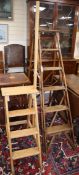 A set of folding mahogany library steps and a set of fixed four tread pine library steps (2)