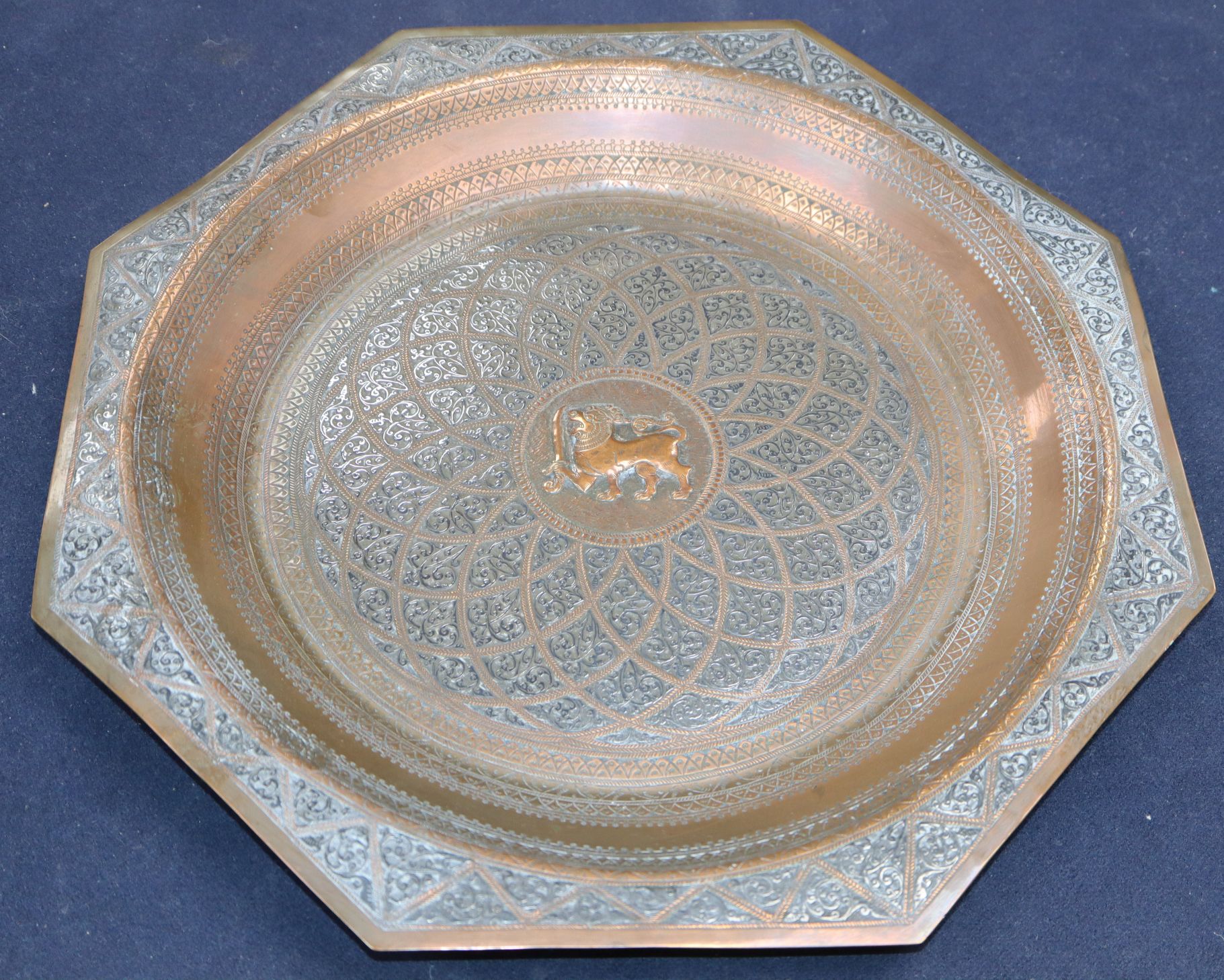 A copper and silver Iranian dish