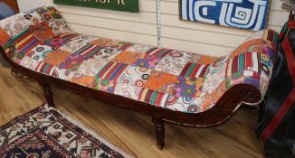 A beech framed scroll end seat, with multi-coloured fabric upholstery L.216cm