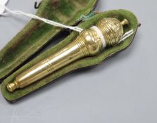 A cased 18th century turned gilt white metal needle case, 7cm.