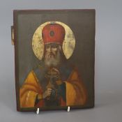 A late 19th century Russian School icon of a bishop Saint, 24 x 19cm