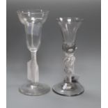 A Georgian pan top wine glass with air twist stem and another glass with bell bowl on inverted