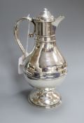 A Victorian silver communion flagon, London 1857, Cox & sons (Thomas & Edward Cox), of engraved