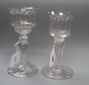 Two 18th century sweetmeat glasses, each with bell-shaped bowl and wrythen Silesian stem, one with
