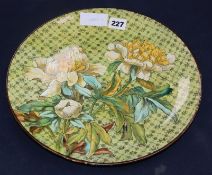 A Doulton lambeth faience dish, by Fanny Stable, c.1880, painted with chrysanthemums diameter 31.