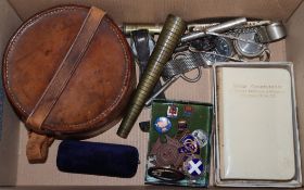 Assorted curios including silver nurses badge and other badges, leather collar box, bible, bone